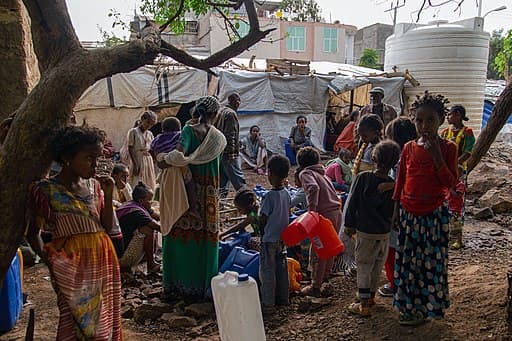 People collect drinking water